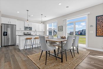 Open concept kitchen with designated dining area